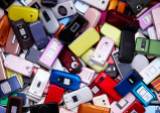 closeup of pile of old mobile phones